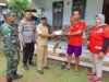 Hujan Lebat Di Sertai Angin Kencang Mengakibatkan Pohon Tumbang Mengenai Satu Rumah Warga